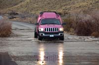 30-Kegan_carefully_driving_through_the_flood