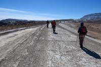 39-group_walking_along_rim_of_flood_detention_reservoir