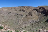 047-scenic_view_looking_east_to_Bob_Gnarly_up_canyon_and_Bomb_Voyage_uphill_to_Muffin_Peak