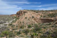 078-wash_cliff,faint_trail_to_left_heading_down_wash