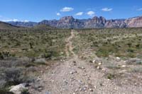 10-continuing_along_dirt_road_with_fee_booth_in_sight