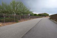 160-Bear's_Best_access_road_runs_along_an_expensive_gated_community