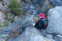 59-Brett_scrambling_down_class_4_descent-several_minutes_later_cliffs_out