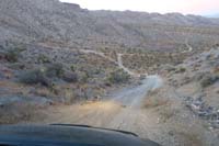 68-carefully_heading_down_steep_slope_at_dusk_in_4WD_low