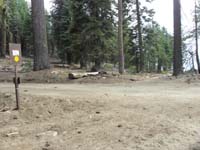 17-at_confusing_sign-road_to_left,trail_straight_ahead-sign_should_be_on_other_side_of_road