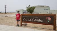 008-Kenny_at_the_Manzanar_National_Historic_Site_Visitor_Center-smoke_blocks_Sierra_Nevada_mountains