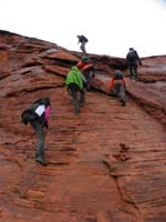 19-scrambling_up_another_wall-still_drizzling-raingear_layer_great-except_for_catsclaw_area_earlier