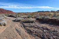 37-cross_several_washes_to_continue_trail,carefully_watch_for_next_trail_marker