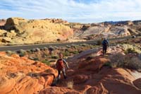 45-walking_back_to_road-reenter_usage_trail_via_wash_and_at_yellow_caution_Dip_sign