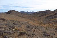 22-scenery_to_east_along_way-we'll_loop_to_those_peaks_to_right,then_left