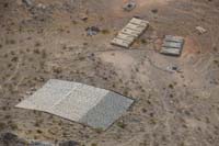 30-zoom_view_of_wildlife_guzzler-1.2_miles_S_of_W_entrance_station-rain_catch_system_to_storage_tanks