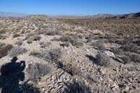 02-sandstone_outcropping_that_has_yet_to_be_covered_by_erosional_debris_close_to_the_road