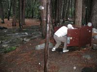 12-Jim_getting_breakfast_out_of_bear_proof_locker