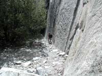 23-Gretchen_hiking_on_trail_along_base_of_El_Capitan