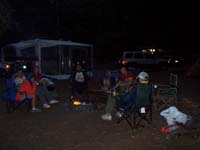 10-everyone_hanging_around_the_campfire