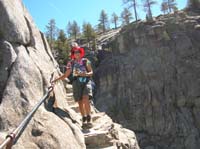 23-Luba_heading_down_to_top_of_Yosemite_Fall