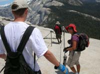 50-Peppe_and_Luba_heading_down_cables-Luba_and_I_will-assist_this_kid