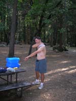 54-Chris_showering_at_campsite