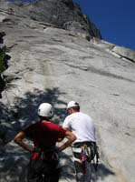 01-Luba_and_Brad_setting_rope_with_Bruce_up_on_a_ledge_setting_anchors