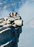 24-Harlan_and_Chad_trying_to_kick_Chris_over_the_edge