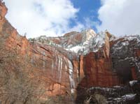 10-sun_peeking_through_to_reveal_the_snow_covered_peaks