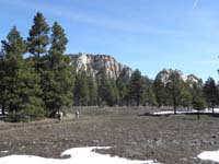 07-Harlan_and_Ali_hiking_along_the_muddy_snow_covered_trail