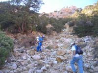 12-Nick_Bill_Harlan_heading_up_the_loose_talus_slope