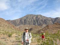 011-me_with_Moapa_Peak_and_Harlan_being_himself_or_perhaps_trying_to_be_himself