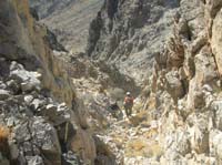 71-Ed_Luba_and_Marlie_lead_the_way_down_the_steep_loose_chute