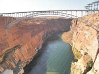 14-Glen_Canyon_Bridge_from_Glen_Canyon_Dam-note_the_extensive_seepage_from_sandstone