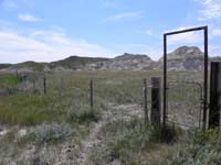 07-after_one_mile_flat_hike_go_through_gate-continue_on_worn_path