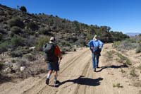 02-walking_back_down_road_a_little_then_up_slope_to_left