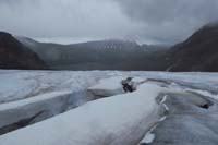044-glacial_feature-looking_back_to_water_cutting_channel_in_ice