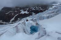 085-another_hiking_group_exploring_a_bigger_glacial_blue_pool