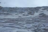 091-looking_back_to_another_tour_group_on_ice_falls_provides_size_perspective