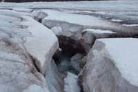 105-glacial_feature-glacial_river_erosion_acts_just_like_flowing_through_rock