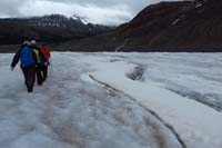 109-glacial_feature-don't_walk_on_that_layer_of_snow,group_walk_along_side